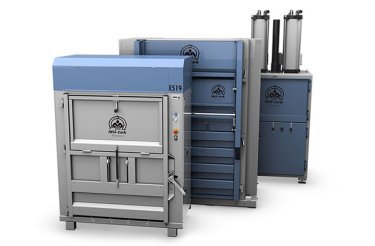 electric baler in front of other balers
